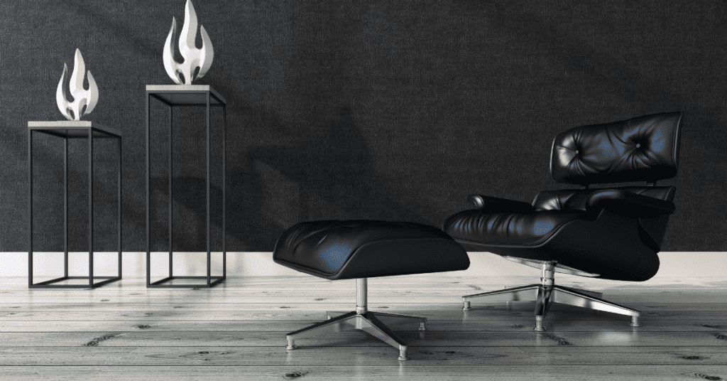 A dark blue recliner in a minimalistic room